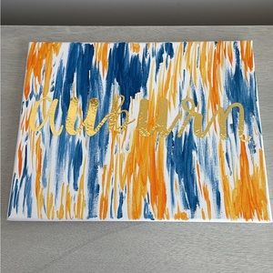 Homemade orange and blue abstract painted canvas